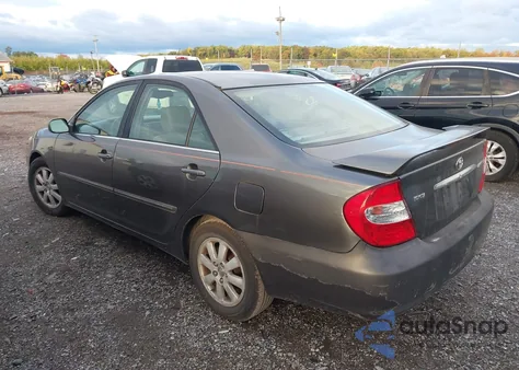 2003 Toyota Camry Xle z USA, uszkodzony, nr VIN 4T1BE30K83U654640